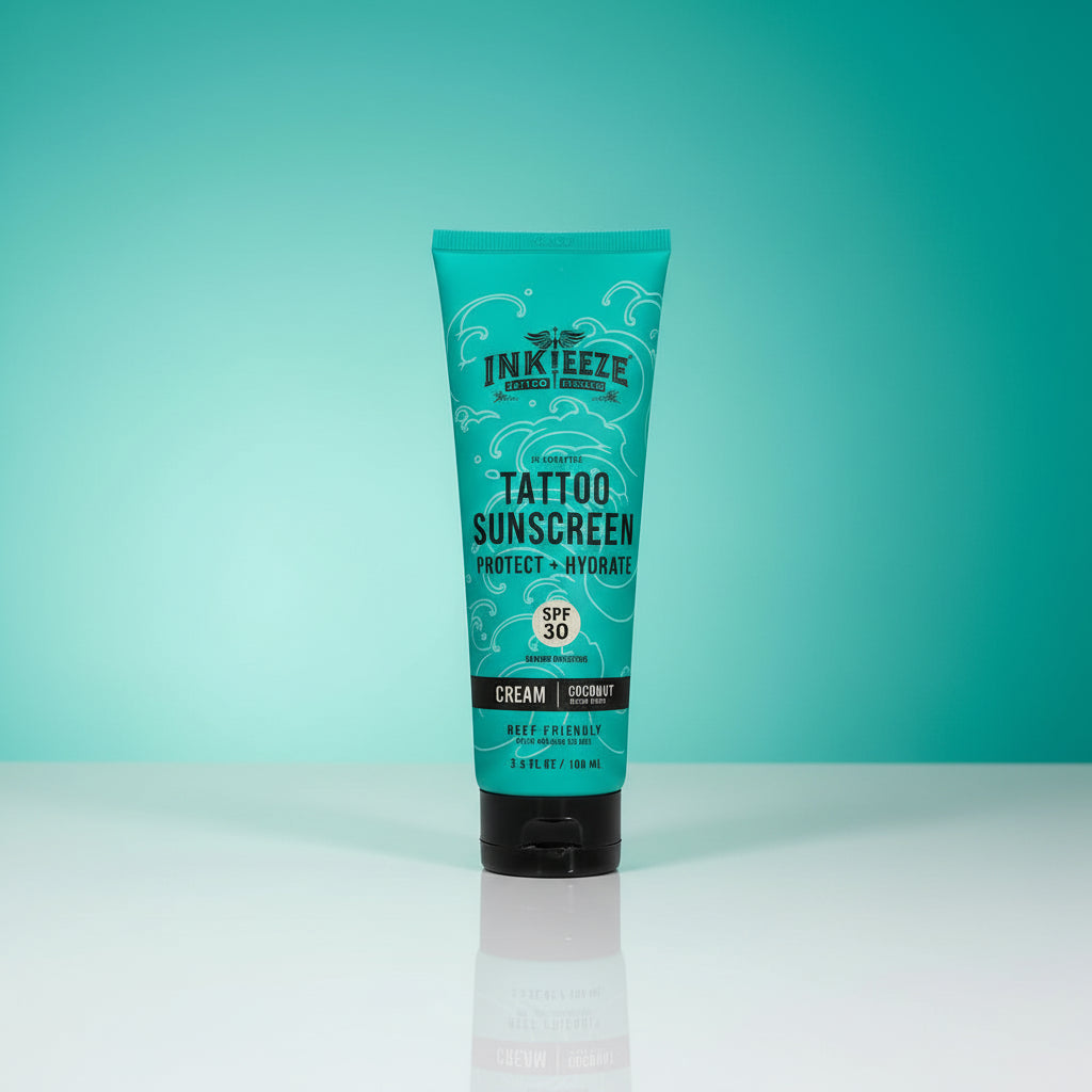 Tube of Inkleeze Tattoo Sunscreen on a teal background